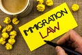 Text sign showing Immigration Law. Conceptual photo National Regulations for immigrants Deportation rules written on Sticky Note P