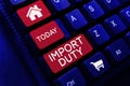 Text sign showing Import Duty. Word for tax imposed by a government on goods from other countries Royalty Free Stock Photo