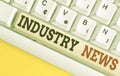Text sign showing Industry News. Conceptual photo Technical Market Report Manufacturing Trade Builder White pc keyboard with empty