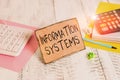Text sign showing Information Systems. Conceptual photo study of systems with a exact reference to information Notepaper Royalty Free Stock Photo