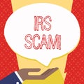 Text sign showing Irs Scam. Conceptual photo involve scammers targeting taxpayers pretending be Internal Service Palm Up