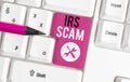 Text sign showing Irs Scam. Conceptual photo targeted taxpayers by pretending to be Internal Revenue Service White pc Royalty Free Stock Photo
