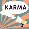 Text sign showing Karma. Internet Concept sum of a person actions in this and previous states of existence