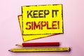 Text sign showing Keep It Simple Motivational Call. Conceptual photo Simplify Things Easy Clear Concise Ideas written on Yellow St