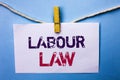Text sign showing Labour Law. Conceptual photo Employment Rules Worker Rights Obligations Legislation Union written on White Note