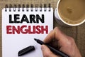 Text sign showing Learn English. Conceptual photo Study another Language Learn Something Foreign Communication written by Man Hold Royalty Free Stock Photo