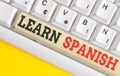 Text sign showing Learn Spanish. Conceptual photo Translation Language in Spain Vocabulary Dialect Speech White pc