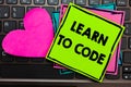 Text sign showing Learn To Code. Conceptual photo Learn to write Software Be a Computer Programmer Coder Papers Romantic lovely me Royalty Free Stock Photo