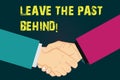 Text sign showing Leave The Past Behind. Conceptual photo Do not look back always go forward Motivation Hu analysis Shaking Hands