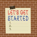 Text sign showing Let S Is Get Started. Conceptual photo to begin doing or working on something you had started Paper lines binder Royalty Free Stock Photo