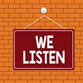 Text sign showing We Listen. Conceptual photo Group of showing that is willing to hear anything you want to say Colored