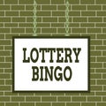 Text sign showing Lottery Bingo. Conceptual photo game of chance in which each player matches numbers printed Whiteboard rectangle