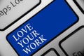 Text sign showing Love Your Work. Conceptual photo Make things that motivate yourself Passion for a job Keyboard blue key Intentio Royalty Free Stock Photo