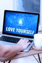 Text sign showing Love Yourself. Internet Concept accepting the overall aspect of ourselves and have selfrespect