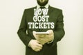 Text sign showing Low Cost Tickets. Conceptual photo small paper bought to provide access to service or show Male human