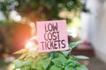 Text sign showing Low Cost Tickets. Conceptual photo small paper bought to provide access to service or show Plain empty Royalty Free Stock Photo