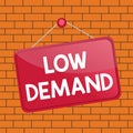 Text sign showing low demand. Conceptual photo less consumer s is desire to purchase goods and services Colored memo reminder