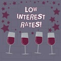 Text sign showing Low Interest Rates. Conceptual photo meant to stimulate economic growth making it cheaper Filled Cocktail Wine