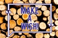 Text sign showing Make A Wish. Conceptual photo To have dreams desires about future events Be positive Wooden background Royalty Free Stock Photo