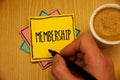 Text sign showing Membership. Conceptual photos Being member Part of a group or team Join an organizationMan creating yellow pink