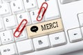 Text sign showing Merci. Word for what is said or response when someone helps you in France Thank you Abstract Doing