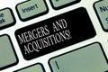 Text sign showing Mergers And Acquisitions. Conceptual photo Refers to the consolidation of companies or assets Keyboard key