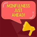 Text sign showing Mindfulness Just Ahead. Conceptual photo training your mind to concentrate on the present Megaphone Royalty Free Stock Photo