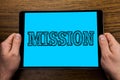 Text sign showing Mission. Conceptual photo Corporate goal Important Assignment Business purpose and focus written on Tablet Scree