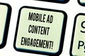 Text sign showing Mobile Ad Content Engagement. Conceptual photo Social media advertising promotion strategies Keyboard Royalty Free Stock Photo