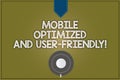 Text sign showing Mobile Optimized And User Friendly. Conceptual photo Modern web online internet services Coffee Cup