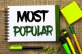 Text sign showing Most Popular. Conceptual photo Top Rating Bestseller Favorite Product or Artist 1st in ranking written on Notebo