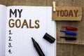 Text sign showing My Goals. Conceptual photo Goal Aim Strategy Determination Career Plan Objective Target Vision written on Notebo