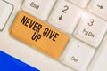 Text sign showing Never Give Up. Conceptual photo Keep trying until you succeed follow your dreams goals.