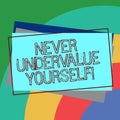 Text sign showing Never Undervalue Yourself. Conceptual photo Certainly not underestimate your real worth Pile of Blank Royalty Free Stock Photo
