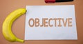 Text sign showing Objective. Conceptual photo Goal planned to be achieved Desired target Company mission Small paper drawing lines