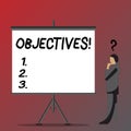 Text sign showing Objectives. Conceptual photo Goals planned to be achieved Desired targets Company missions Businessman