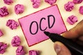 Text sign showing Ocd. Conceptual photo Obsessive Compulsive Disorder Psychological Illness Medical Condition written by Man on St