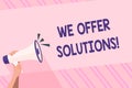 Text sign showing We Offer Solutions. Conceptual photo way to solve problem or deal with difficult situation Human Hand