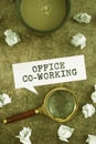 Text sign showing Office Co Working. Word for Business services providing shared spaces to work Businessman Checking