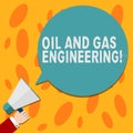 Text sign showing Oil And Gas Engineering. Conceptual photo Petroleum company industrial process engineer Hu analysis Hand Holding Royalty Free Stock Photo