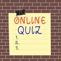 Text sign showing Online Quiz. Conceptual photo game or a mind sport that are published on the Internet Paper lines binder clip