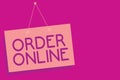 Text sign showing Order Online. Conceptual photo Buying goods and services from the sellers over the internet Pink board wall mess