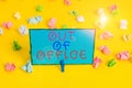 Text sign showing Out Of Office. Conceptual photo Outside the job Nobody in business Break Leisure Relax time Colored Royalty Free Stock Photo