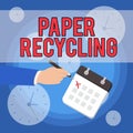 Text sign showing Paper Recycling. Conceptual photo Using the waste papers in a new way by recycling them Male Hand