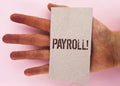 Text sign showing Payroll Motivational Call. Conceptual photo Total salaries paid by a company to its employees written on Cardboa