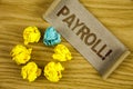 Text sign showing Payroll Motivational Call. Conceptual photo Total salaries paid by a company to its employees written on Folded