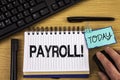 Text sign showing Payroll Motivational Call. Conceptual photo Total salaries paid by a company to its employees written on Noteoad