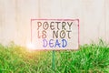 Text sign showing Poetry Is Not Dead. Conceptual photo aesthetic and rhythmic writing is still alive and modern Crumpled