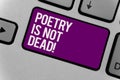 Text sign showing Poetry Is Not Dead. Conceptual photo aesthetic and rhythmic writing is still alive and modern Keyboard key offic
