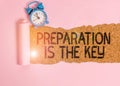 Text sign showing Preparation Is The Key. Conceptual photo it reduces errors and shortens the activities Alarm clock and